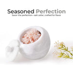 White marble salt cellar with lid open, filled with pink Himalayan salt, 4 inches wide and 3.5 inches tall