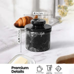 Black stone marble butter keeper measuring 4 inches tall and 3.5 inches in diameter