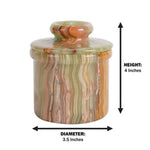 Green onyx marble butter keeper measuring 4 inches tall and 3.5 inches in diameter