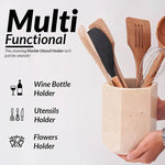 Hexagon verona marble utensil holder held in hand, doubling as a wine bottle and flower holder
