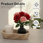 Natural brown marble dough bowl holding a candle and rose vase, showing natural marble and sturdy base