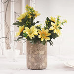 Oceanic marble utensil holder used as a flower vase on a set dining table