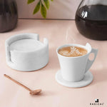 RADICALn round white marble coaster set and holder beside a coffee cup and copper spoon