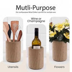 Round natural brown marble wine chiller used as a utensil holder, wine bottle cooler and flower vase