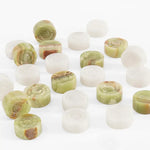 White marble and green onyx checkers discs scattered overhead — multi-tonal green amber banding visible by RADICALn