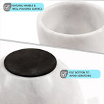White marble shaving bowl details: polished surface and scratch-preventing felt bottom