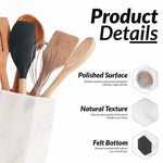 White marble utensil crock details: polished surface, natural texture and scratch-preventing felt bottom