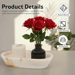 White onyx marble dough bowl holding a candle and rose vase, showing natural marble and sturdy base