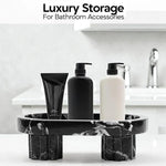 Black footed marble tray holding pump bottles as bathroom storage by a sink