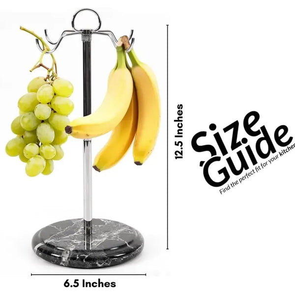 Black marble banana holder measuring 12.5 inches tall and 6.5 inches wide, hung with bananas and grapes