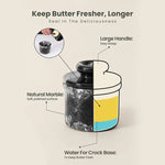 Black marble butter keeper cutaway showing large lid handle and water in the crock base