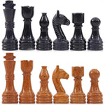 Black marble and golden marble chess pieces lineup — king queen bishop knight rook pawn by RADICALn