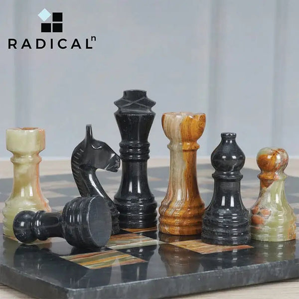 Black and multi green onyx marble chess pieces lineup — rook knight king bishop queen pawn by RADICALn