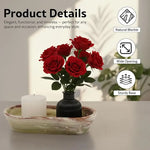 Green onyx marble dough bowl holding a candle and rose vase, showing natural marble and sturdy base