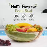Green onyx marble fruit bowl filled with mango, pear and grapes on a kitchen counter, also suited to vegetables, candies or cookies