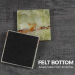 Green onyx square coaster flipped to show its black felt bottom