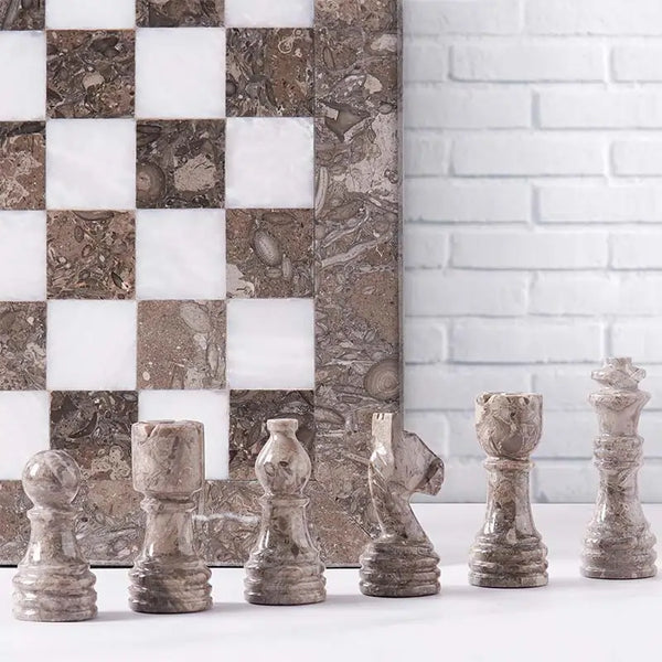Grey oceanic marble chess pieces lineup — pawn bishop knight rook king queen with grey oceanic and white board edge by RADICALn