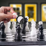 Hand lifting white chess pawn with felt bottom detail — black and white pieces in starting position by RADICALn