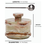 Handcrafted marble salt cellar with spoon, a sleek and elegant addition to any kitchen.