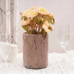 Marinara marble utensil holder used as a flower vase on a set dining table
