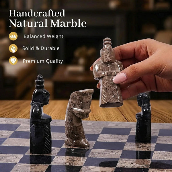 Medieval figurative pieces from the Oceanic and black antique marble chess set, with a hand lifting the oceanic king