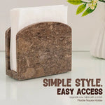 Oceanic marble napkin holder filled with white napkins on a styled countertop
