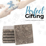 Stack of six oceanic marble square coasters shown as a gift alongside a wrapped present