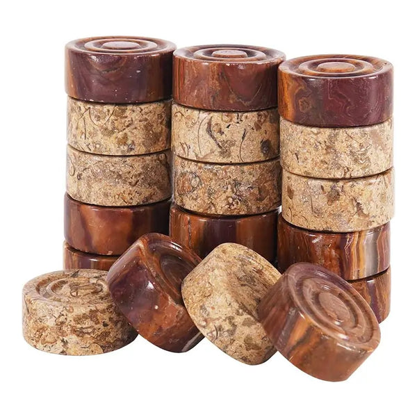 Red and fossil coral marble checkers pieces stacked — showing stackable natural stone disc construction by RADICALn