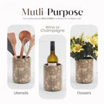 Round oceanic marble wine chiller used as a utensil holder, wine bottle cooler and flower vase