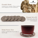 Round oceanic stone coaster set of 6 showing raw stone, full set and a glass on a coaster