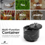 Black marble container shown as a multi-use keeper for salt, tea, grains, spices, nuts and jewelry