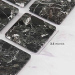 Square black marble coasters with white veining, 3.5 inches across