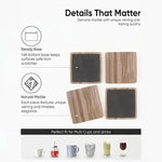 Square natural brown marble coasters showing felt bottoms and fit with mugs, glasses and stemware