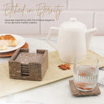 Square oceanic marble coaster set with holder on a linen runner beside a teapot