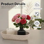 Travertine marble dough bowl holding a candle and rose vase, showing natural marble and sturdy base