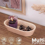 Verona marble dough bowl as multi-purpose decor holding a candle and pinecones