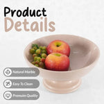 Verona marble pedestal fruit bowl holding apples and grapes, showing the natural stone and polished finish