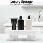White footed marble tray holding pump bottles as bathroom storage by a sink