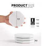 White octagon marble coaster held in hand, 3.5 inches wide and 0.5 inches thick
