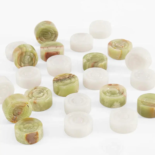 White marble and green onyx checkers discs scattered overhead — multi-tonal green amber banding visible by RADICALn