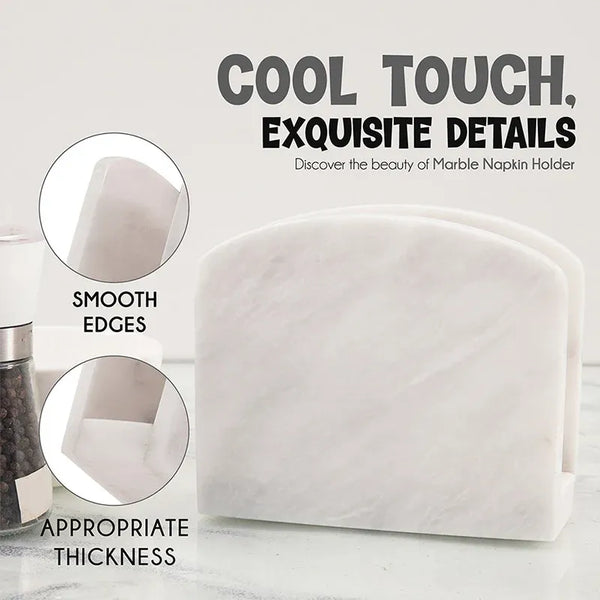 White marble napkin holder detail showing smooth edges and thickness beside a pepper mill