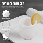 White marble shot glass features: wide opening, natural stone and sturdy base