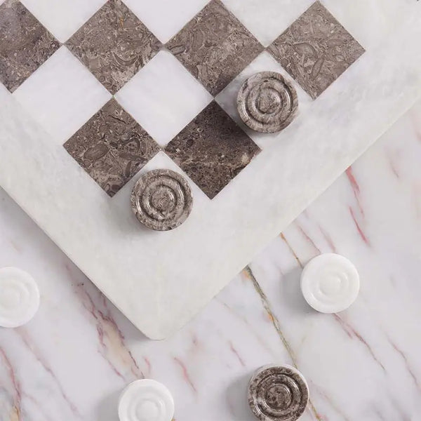 White and oceanic marble checkers set 15 inch — board corner detail with white and oceanic marble disc pieces on marble surface by RADICALn