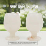 White onyx marble wine glasses on an outdoor table keeping wine at serving temperature