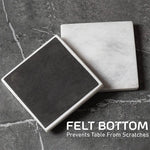 White square coaster flipped to show its black felt bottom