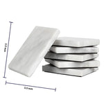 Set of white square marble coasters, each 3.5 inches across